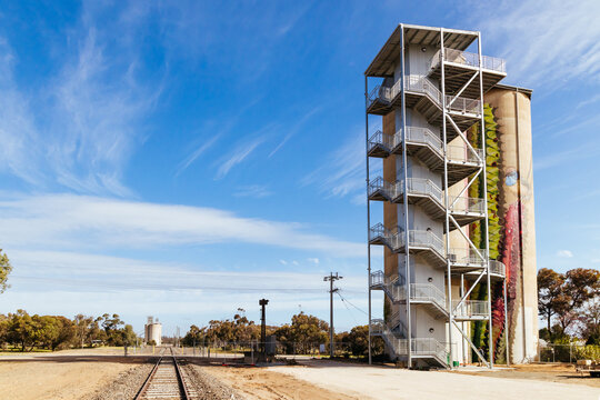 RAINBOW, AUSTRALIA - SEPTEMBER 26 2025: Rainbow silo on a sunny spring day beside railway