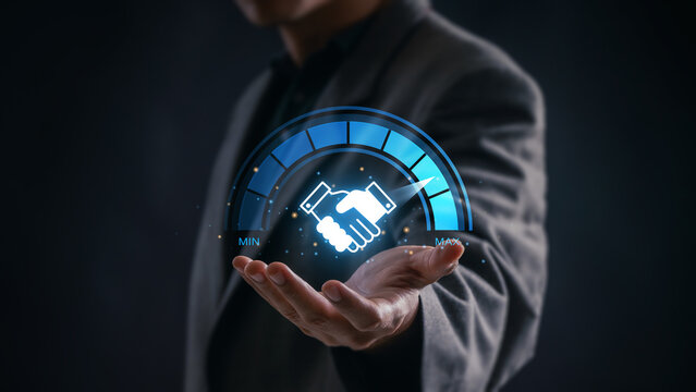 Trust and performance concept in business partnership showing handshake icon with full confidence meter, representing high level collaboration, commitment and mutual success in corporate relationships