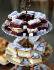 Delicious cookies on plates in the kitchen