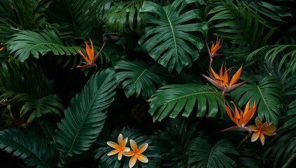 Tropical Flora Arrangement Lush Green Leaves with Accents of Vibrant Orange and Yellow Blooms.