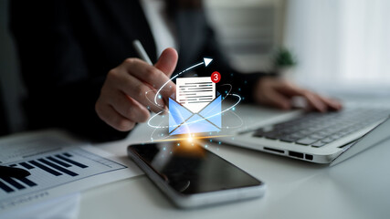 Concept of digital communication and correspondence. Receiving a new message or notification in an...