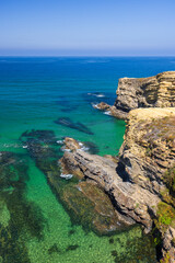 Fototapeta premium Atlantic ocean washing rugged cliffs Odemira Portugal
