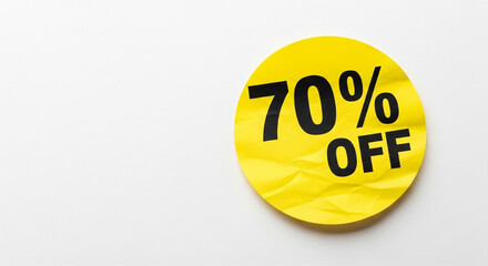 Eye-catching yellow sticker boldly announces a massive 70% OFF sale, creating urgency and driving customer interest for incredible deals.