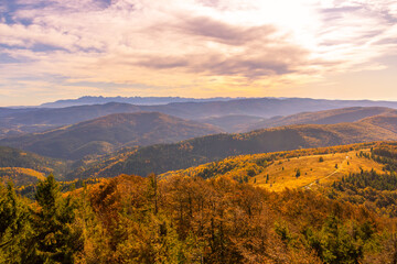 Fototapeta premium Panorama of autumn mountains and sky at sunset