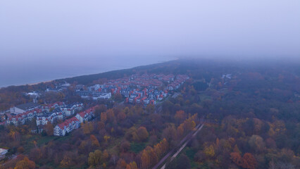 Aerial view of the Jelitkowo district in Gdansk, Poland, on a foggy day.