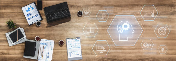 Head with gear and icons representing learning, digital training, and development process, showing...