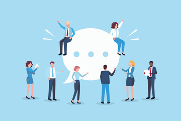 Diverse business people communicate and collaborate around a large speech bubble illustration