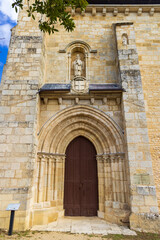 Naklejka premium Historic Romanesque entrance of La Sauve Majeure Abbey facade, France