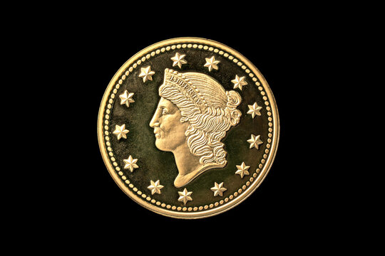 USA one dollar gold coin replica with the Liberty Head on the obverse front and the date of 1849 on the reverse back cut out and isolated on a black background, coinage collecting stock photo
