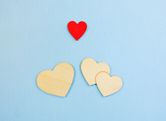 vibrant love emphasis, red and wooden hearts showcase inspiring leadership themes visually, colorful heart symbols combined with wooden textures emphasize bold leadership and standout love