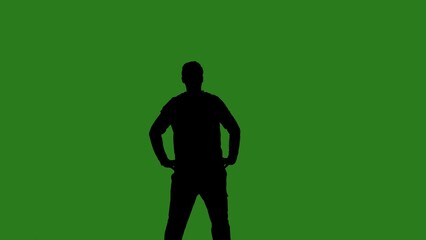 A black silhouette of a man dances cheerfully against a green chroma key background. Minimalist contrast and modern visual composition, mockup.