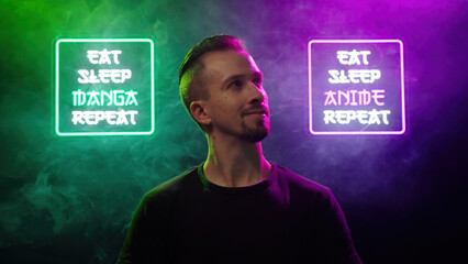 Male person look between two futuristic neon signs Eat Sleep Manga Repeat and Eat Sleep Anime Repeat