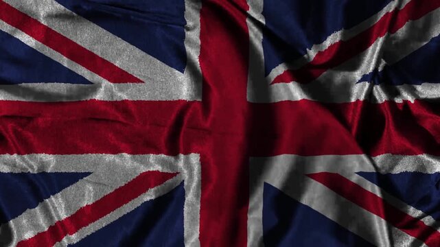 Union Flag or Union Jack the united kingdom flag representing a unified Great Britain of Wales, Scotland, Northern Ireland & England, combining the patron saint crosses waving in a gentle breeze