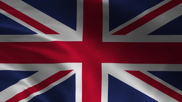 Union Flag or Union Jack the united kingdom flag representing a unified Great Britain of Wales, Scotland, Northern Ireland & England, combining the patron saint crosses waving in a gentle breeze