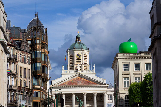 Giant green apple on the roof of Musee Magritte Museum near Mont des Arts garden and Place Royale on May 25, 2025 in Brussels, Belgium.