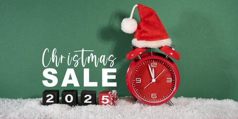 Christmas sale xmas shopping banner design. Christmas sale text in seasonal holiday discount offer with countdown alarm clock in santa hat in snow, shop promotion ads.