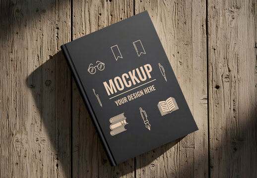 Smooth Cover Book Mockup On Rustic Weathered Wood With Dappled Shadows