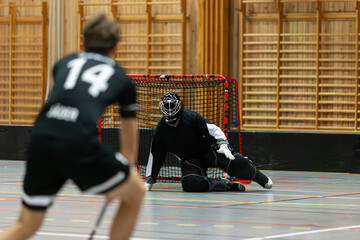 Floorball goalie ready to make a save