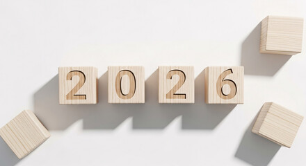 Wooden cubes with the numbers 2026 representing the upcoming new year. Concept of future planning, goals, and new beginnings