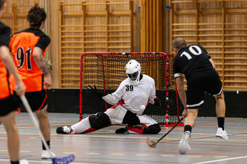 Floorball goalie makes a great save