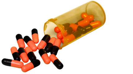 Orange and black capsules spilling from transparent orange prescription pill bottle, pharmaceutical medication and healthcare concept, isolated on transparent background, PNG.