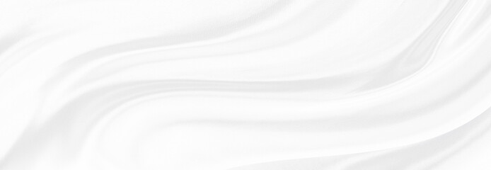 White gray satin texture that is white silver fabric silk panorama background with beautiful soft blur pattern natural.