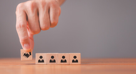 Empathy in the workplace building teamwork and collaboration among individuals for enhanced leadership and trust through wooden blocks representing emotional intelligence and diversity