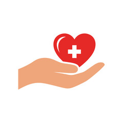 Obraz premium Hand holding a red heart with a white cross symbol representing healthcare.
