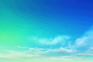 Obraz premium Bright summer sky with a green-blue gradient during daytime over a tranquil landscape adorned with soft clouds