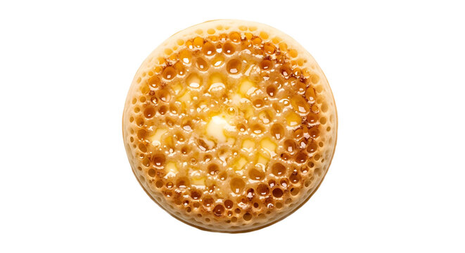 A single crumpet with holes on transparent background