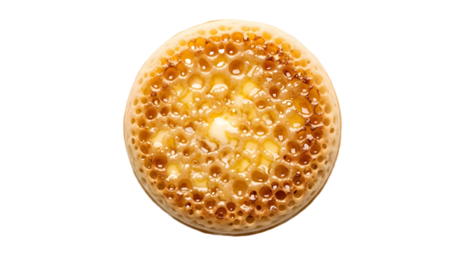 A single crumpet with holes on transparent background