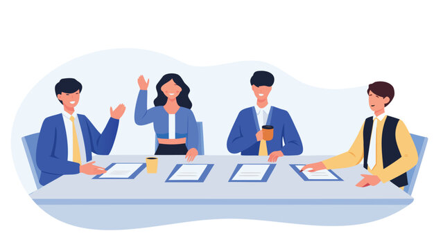 Diverse group of four business professionals sitting at a table reviewing documents and engaging in a meeting discussion