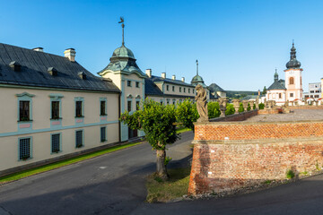 Fototapeta premium Manetin Castle facade and Church of Saint John the Baptist in Czechia