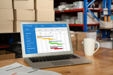 Project planning software for modish business project management on the computer screen showing...