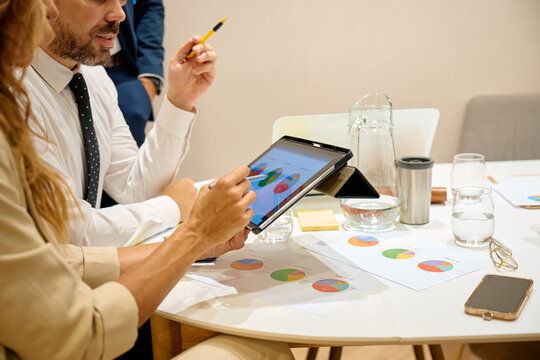 Business colleagues analyzing data during a team meeting