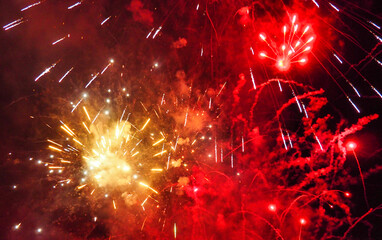 red and yellow fireworks in the night