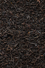 Fresh Black Tea Leaves with Dried Flowers and Fruit Macro Shot