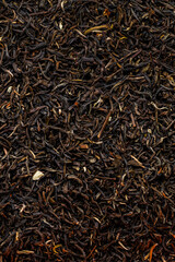 Fresh Black Tea Leaves with Dried Flowers and Fruit Macro Shot