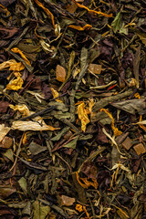 Fresh Green Tea Leaves with Floral, Herbal, and Fruit Ingredients Macro Shot
