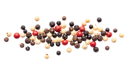 Colorful peppercorns arranged in decorative pattern, showcasing variety of textures and shades, perfect for culinary use