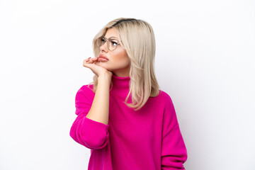 Fototapeta premium Young Russian woman isolated on white background is a little bit nervous