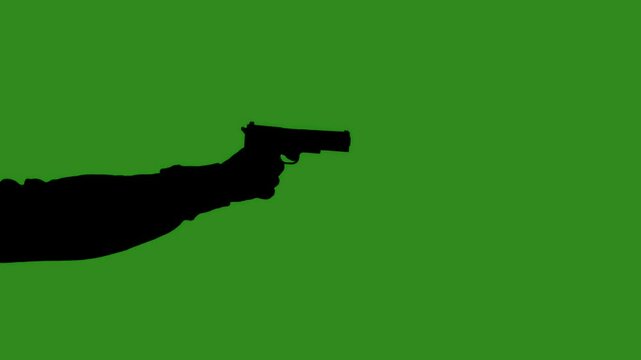 Black isolated silhouette of a hand with a gun on a green chromakey background. Minimalist contrast and modern visual composition, mockup.