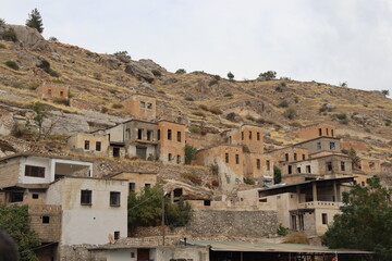 Traditional Stone Houses Built on a Rocky Hillside in Turkey. 