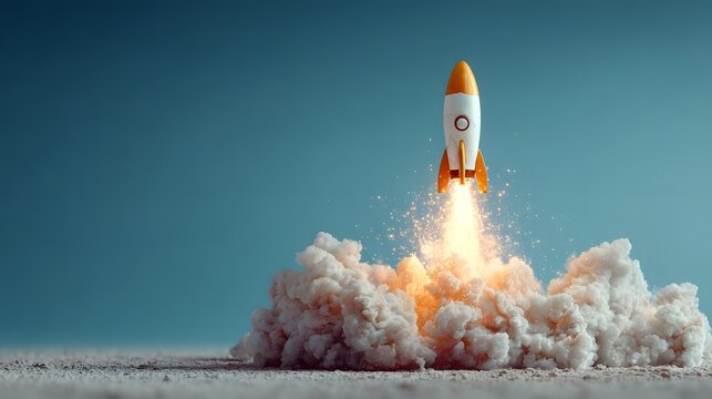 Sleek, white and gold toy rocket launches upwards in this minimalist, inspiring photo. It leaves a trail of shimmering sparks and billowing smoke against a blue background.