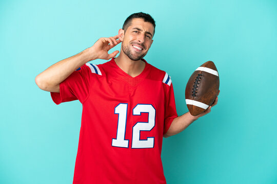 Young caucasian man playing rugby isolated on blue background having doubts - Powered by Adobe
