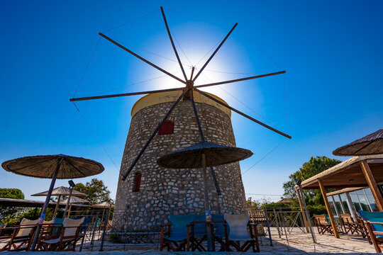 Old windmill at Agios Ioannis beach, Lefkada, Greece. Ruin of an old windmill.