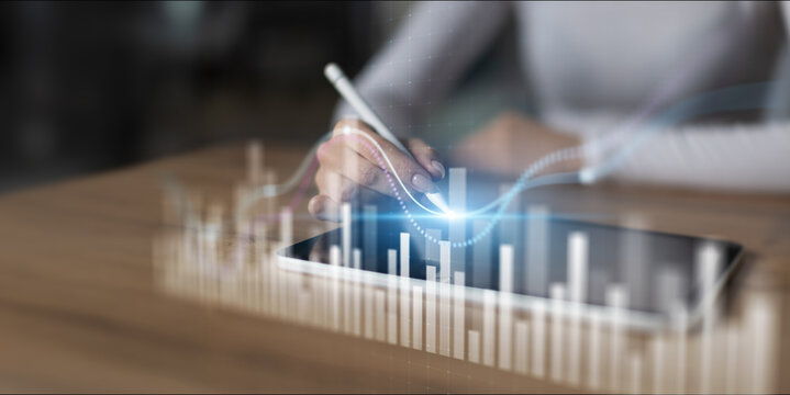 Interactive Data Visualization and Business Analytics Interface Projected on Virtual Screen.