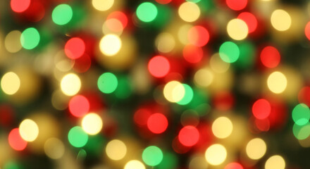 Obraz premium Beautiful Christmas bokeh light background with a mix of red, green, and gold lights, perfect for creating a festive ambiance