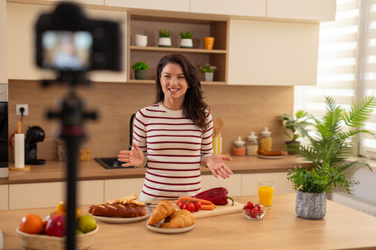 Woman vlogging food recipe for online cooking channel