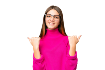 Teenager girl over isolated chroma key background with thumbs up gesture and smiling